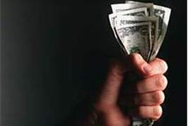 Someone holding money