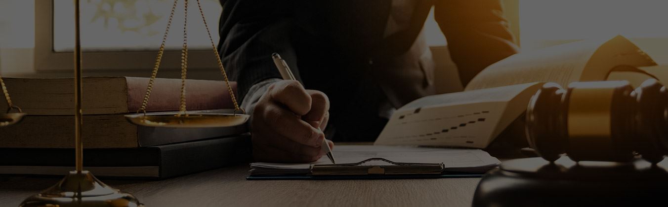A man signing a document